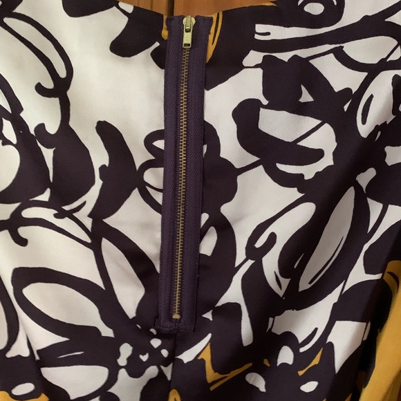 Mustard colored mid length dress with white and dark purple accents - Picture 3 of 7